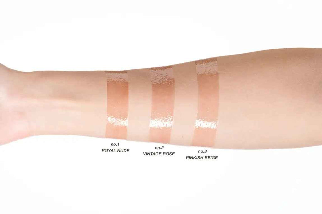 Pierre Rene vintage rose lip oil swatch on arm showing glossy natural pink shade no2