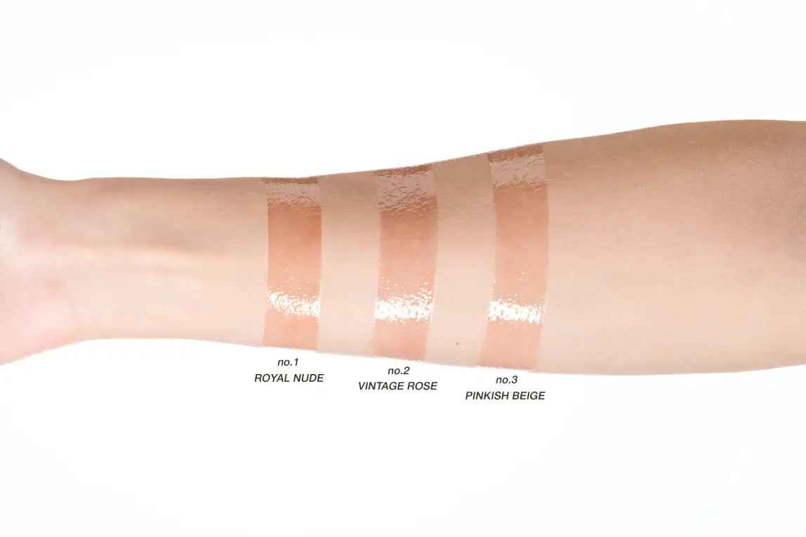 Pierre Rene vintage rose lip oil swatch on arm showing glossy natural pink shade no2